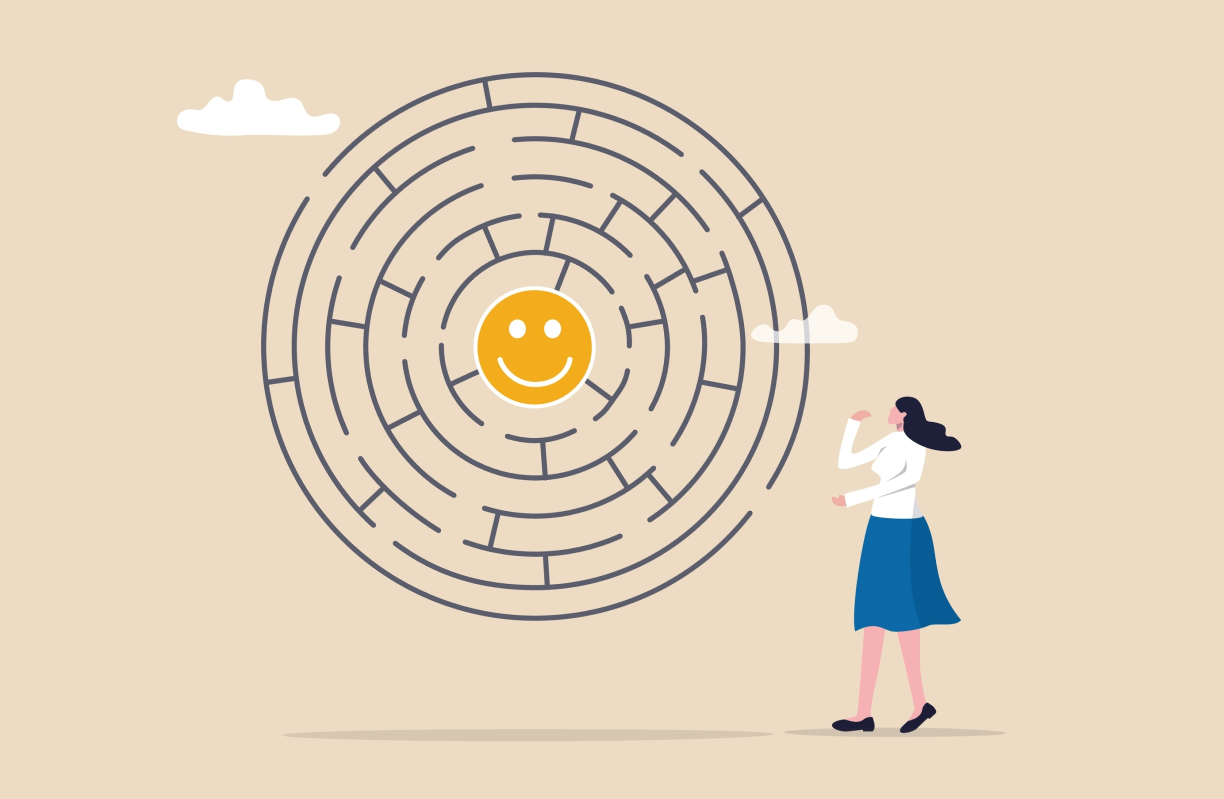 Illustration of a woman standing before a circular maze with a happy face in its center
