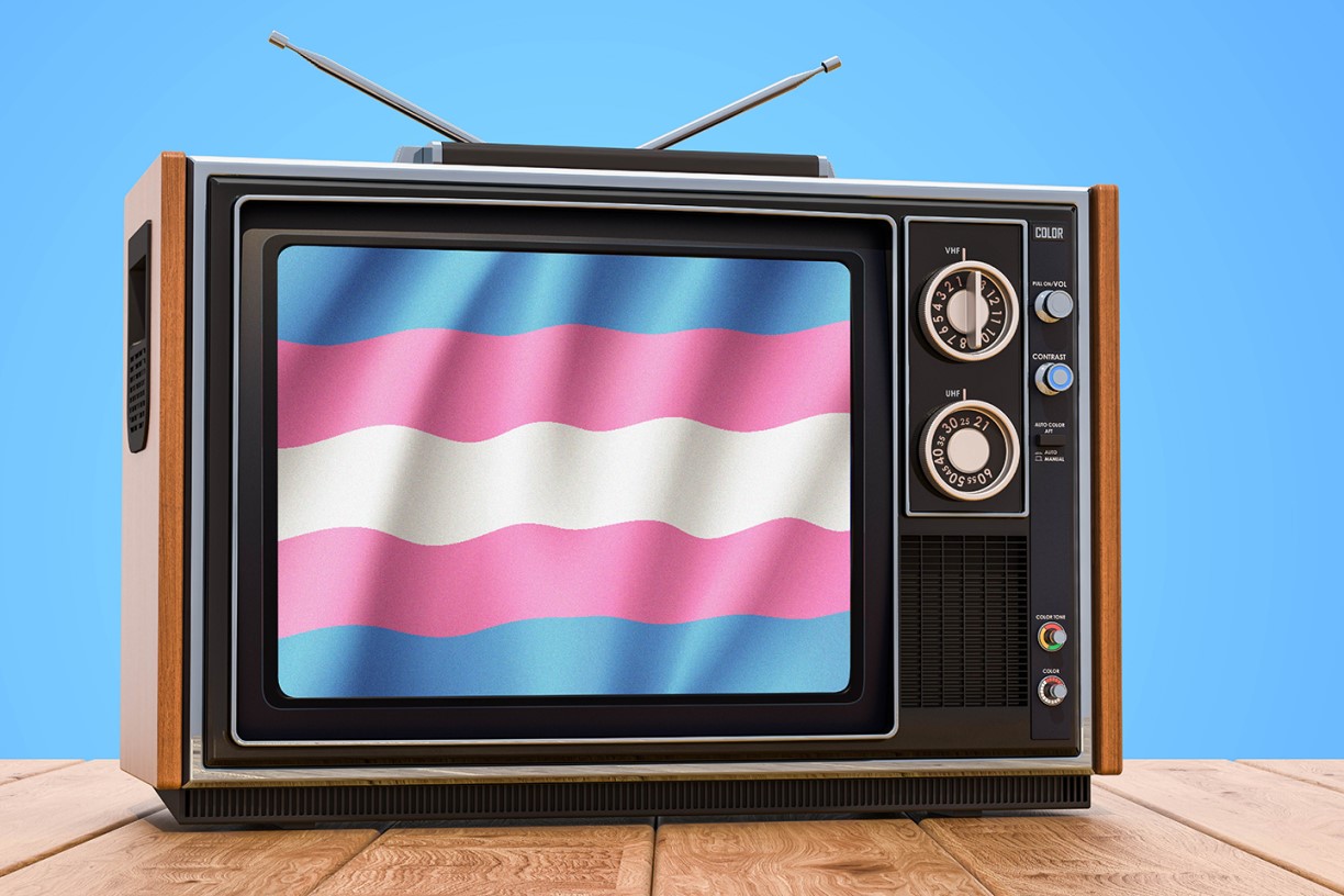 Photo illustration showing 1970s era TV set with the blue-, pink- and white-striped transgender pride flag inset in the screen