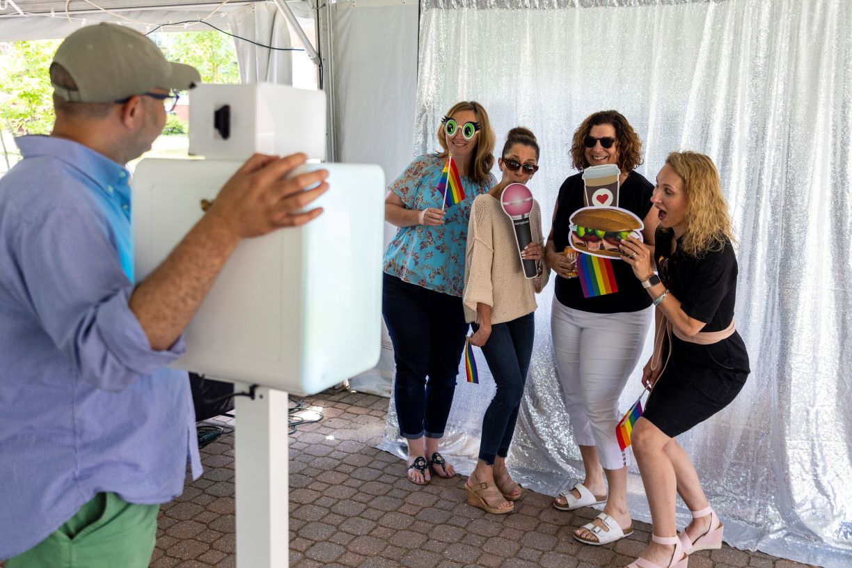 Bentley community poses in photo booth
